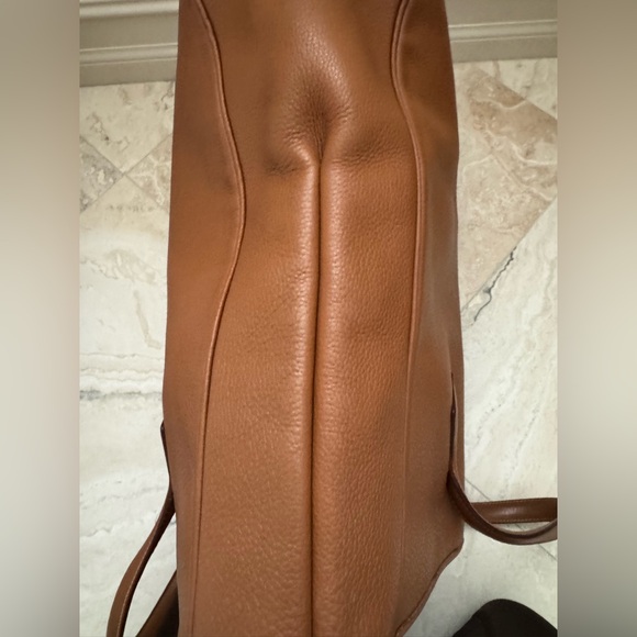 Hermes Tan Leather Tote Bag
Approx 16.5” high X 6”deep X 13” wide 6” strap drop - Picture 7 of 10